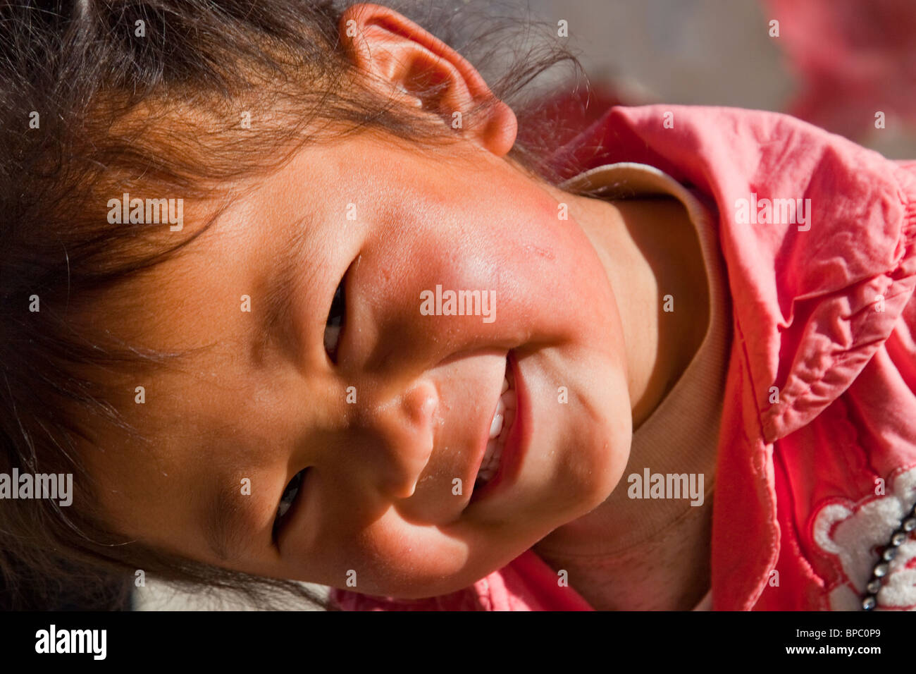 Ethnic minority Chinese girl in Shangri-La or Zhongdian in Yunnan Province, China Stock Photo