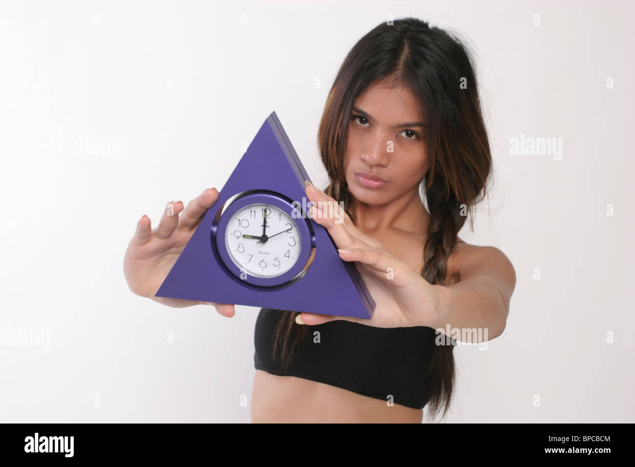girl show triangle clock watch Stock Photo
