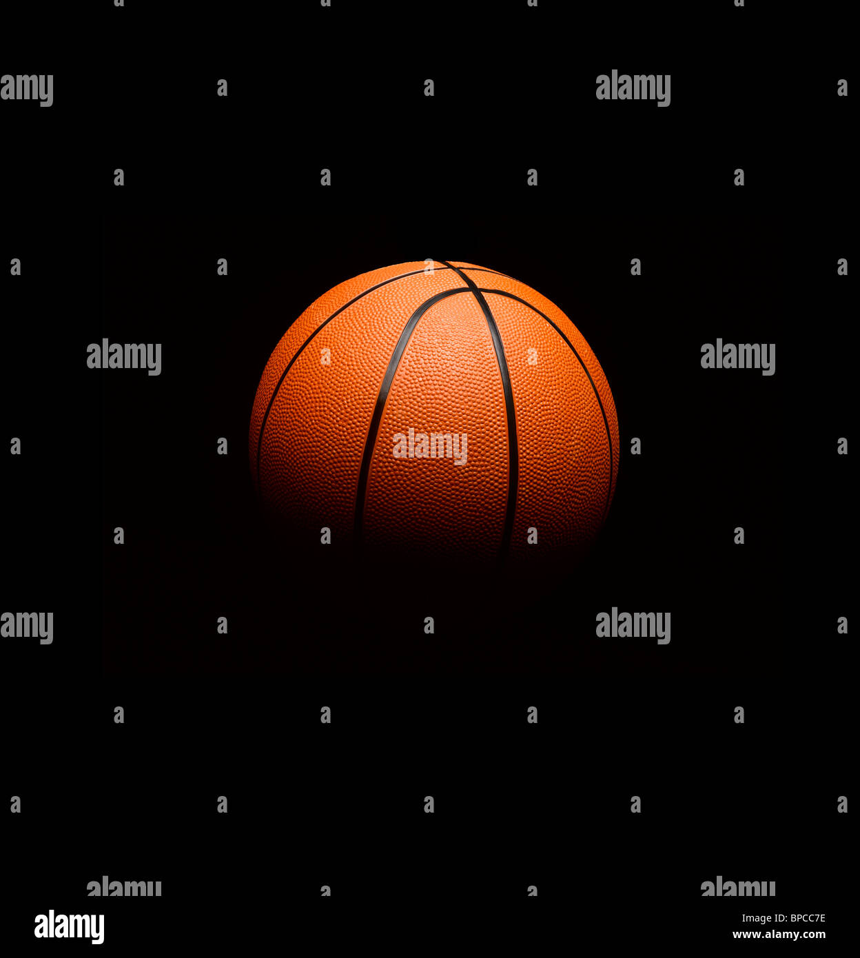 Basketball floating in space Stock Photo