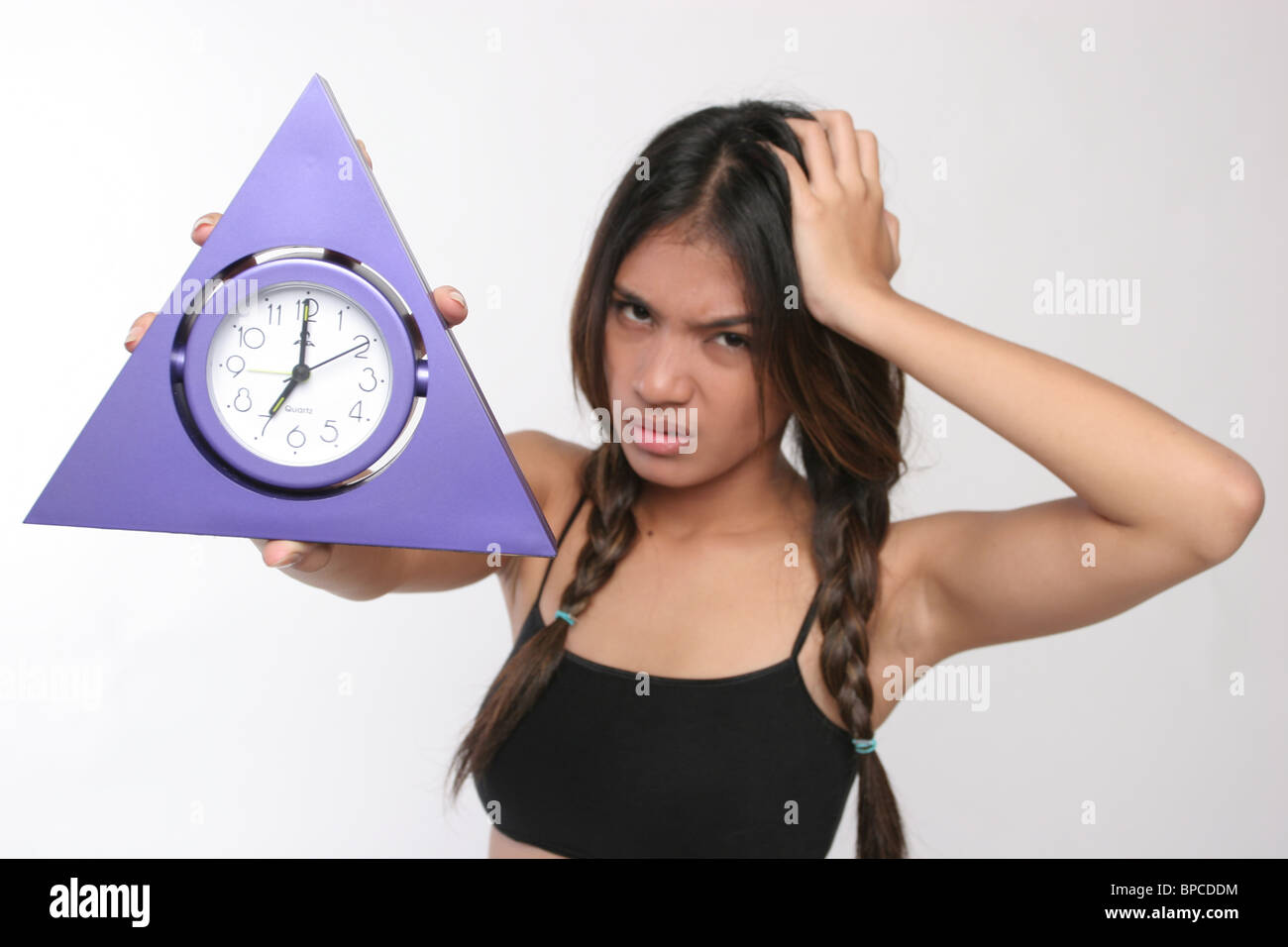girl show triangle clock watch Stock Photo