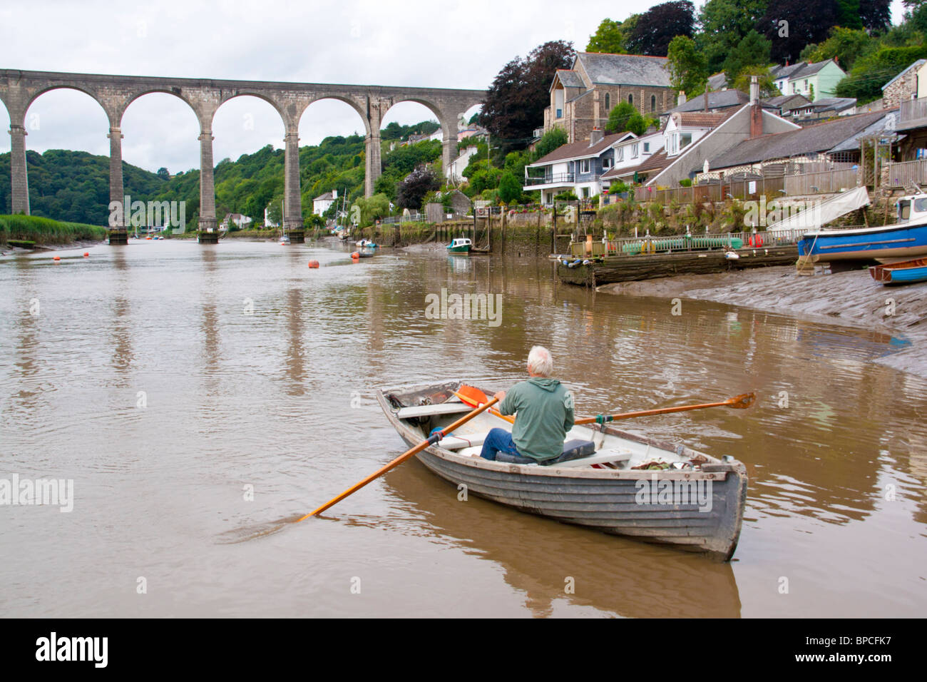 Person rowing on the River Tamar at Calstock Cornwall Stock Photo