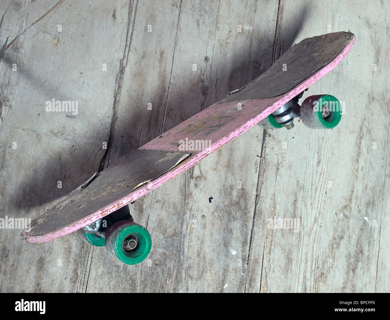 Old battered skateboard in grunge style Stock Photo - Alamy