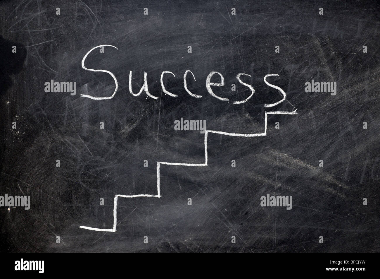 Ladder to success on black chalkboard with chalk dust. Stock Photo