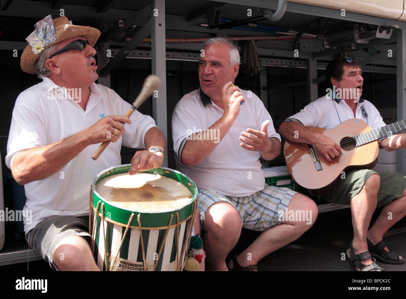 Musicians play and sing traditional songs as part of the fiesta in