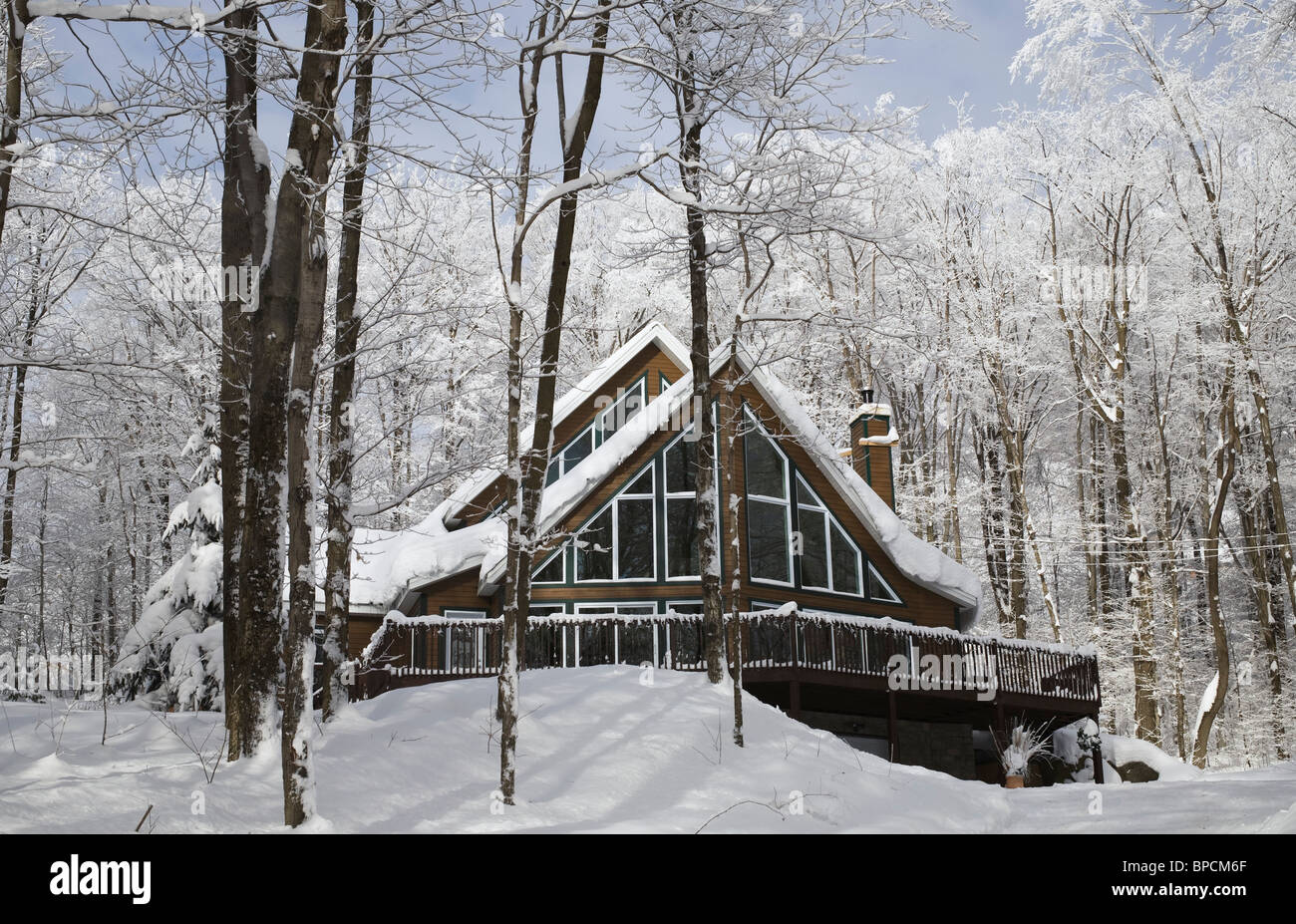 shefford, quebec, canada; a house covered in snow in the winter Stock