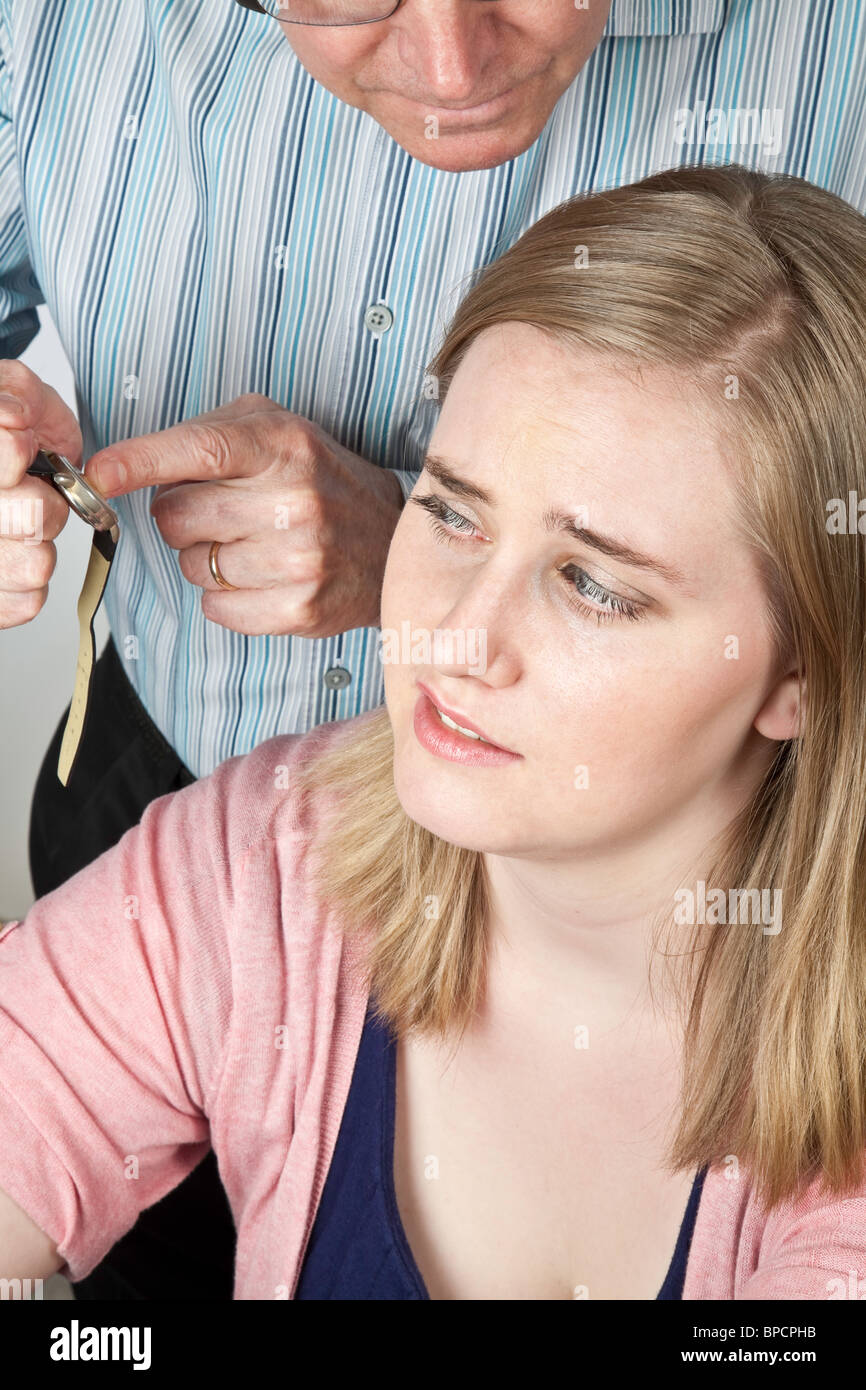 Parent Confronting Late Teenage Girl Stock Photo