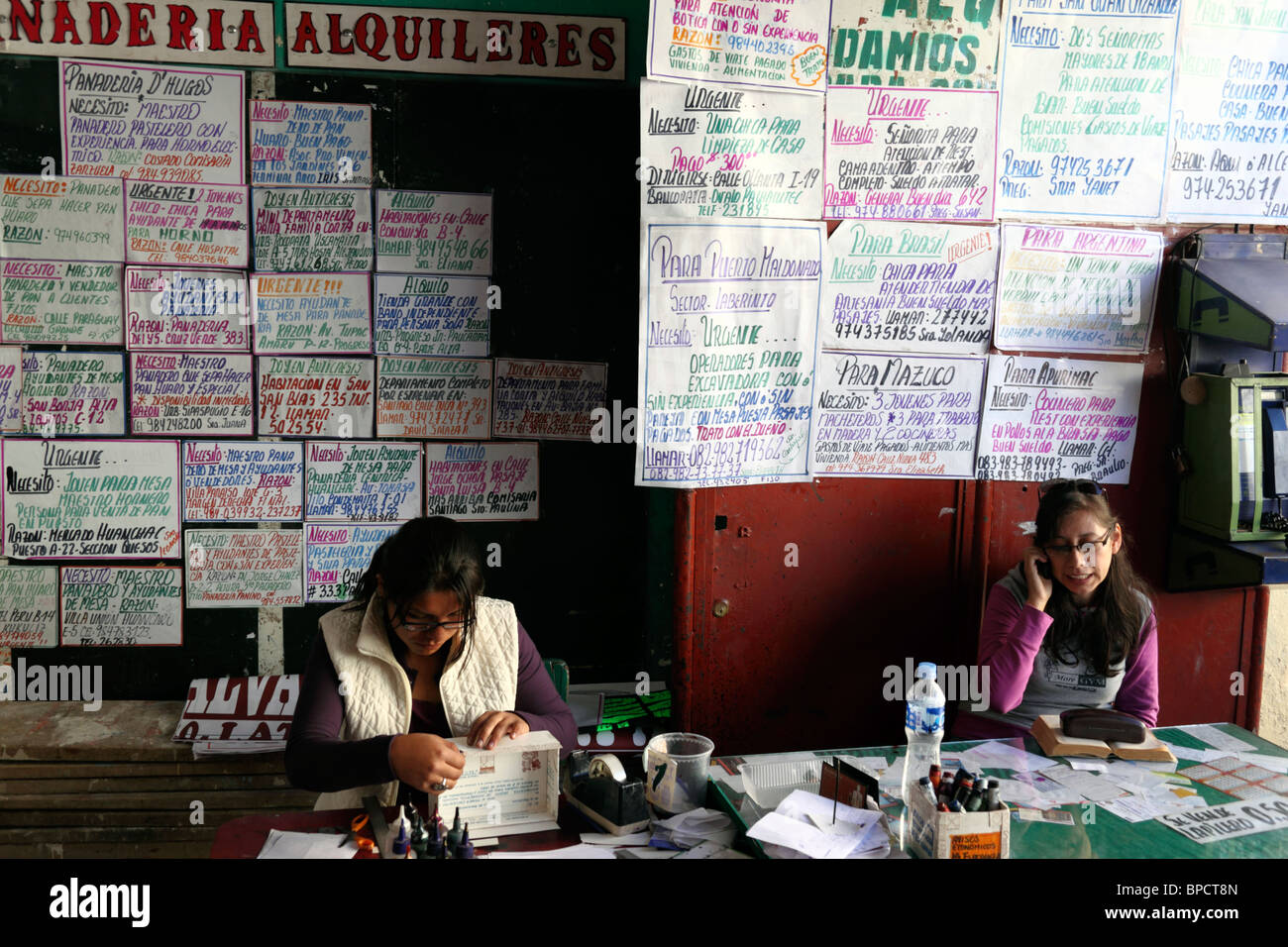 Staff inside unemployment office , Cusco , Peru Stock Photo