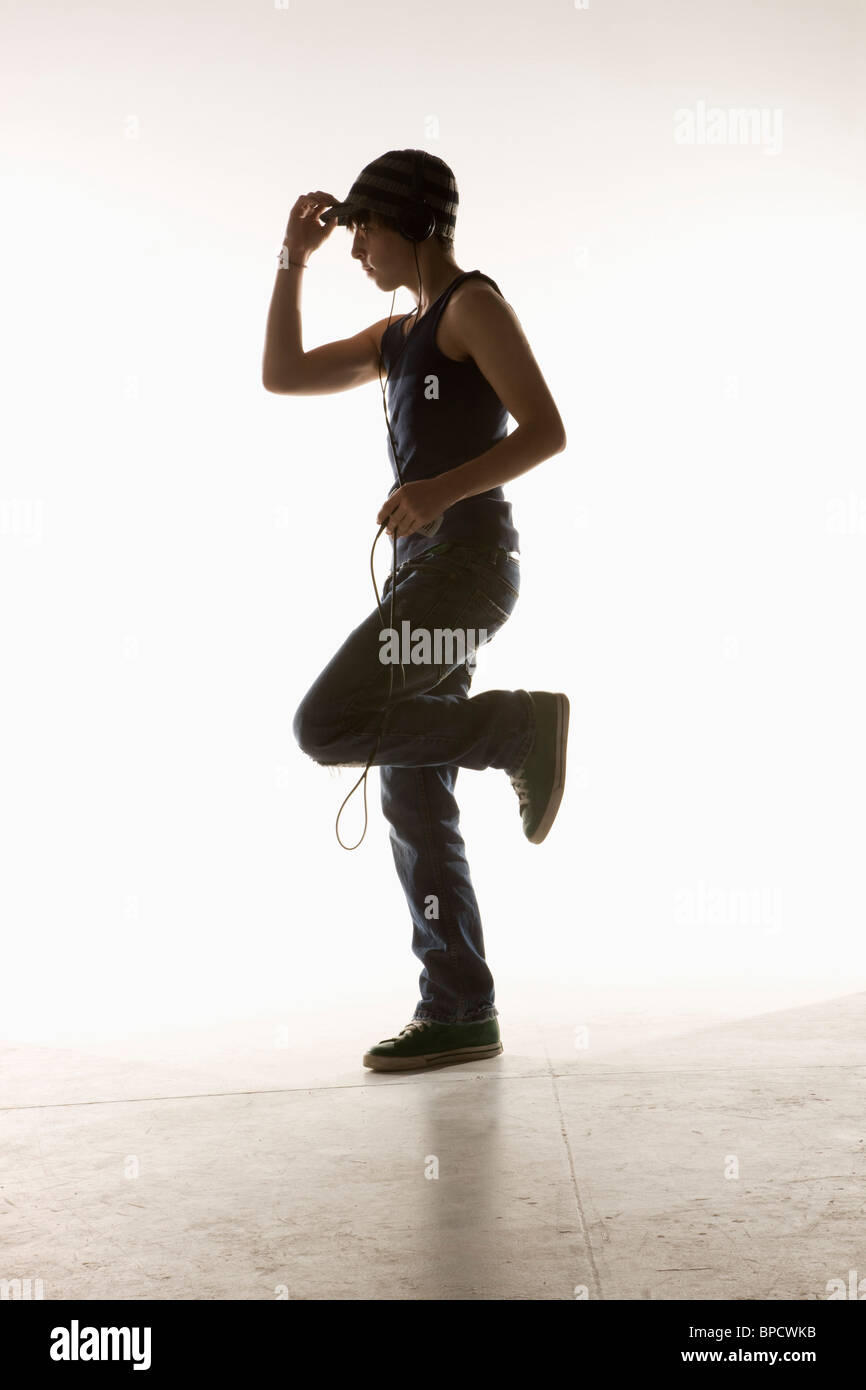 a boy dancing with headphones Stock Photo Alamy