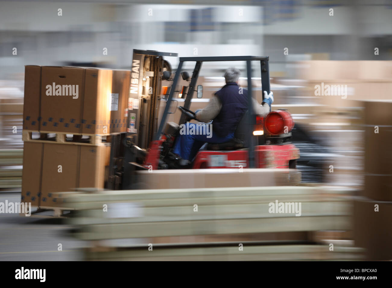 A forklift driver of a freight forwarding company Stock Photo