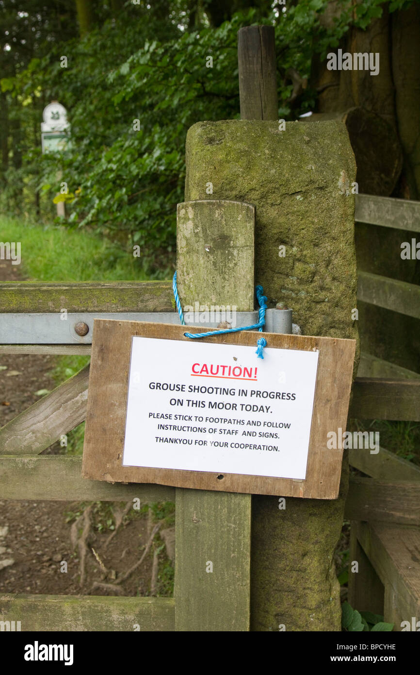 sign saying grouse shooting in progress beware peak district national park derbyshire england uk Stock Photo