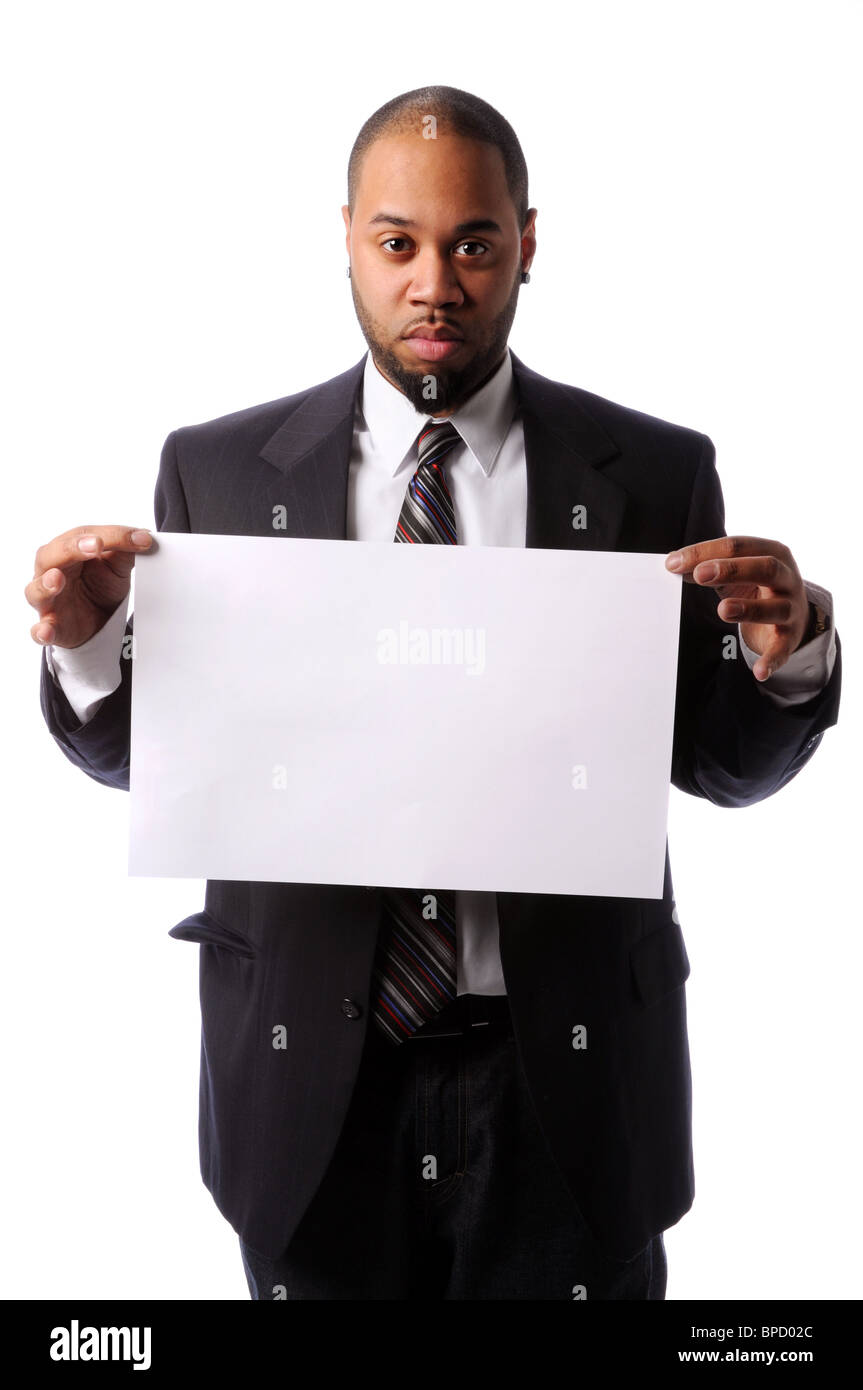 Portrait of African American businessman holding blank sign Stock Photo