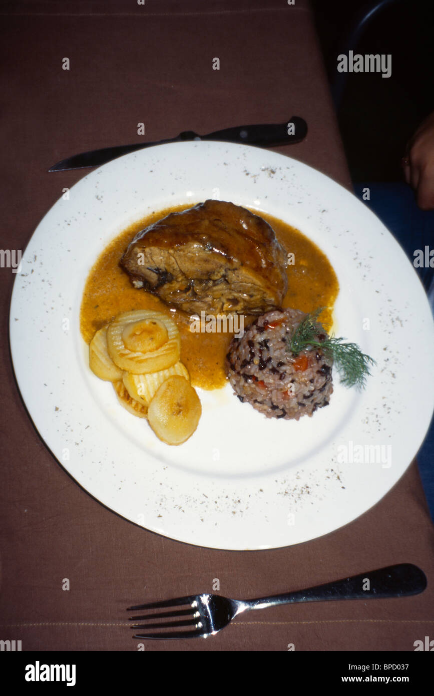 Rome Italy Roast lamb with Chipped Potatoes & Rice Stock Photo