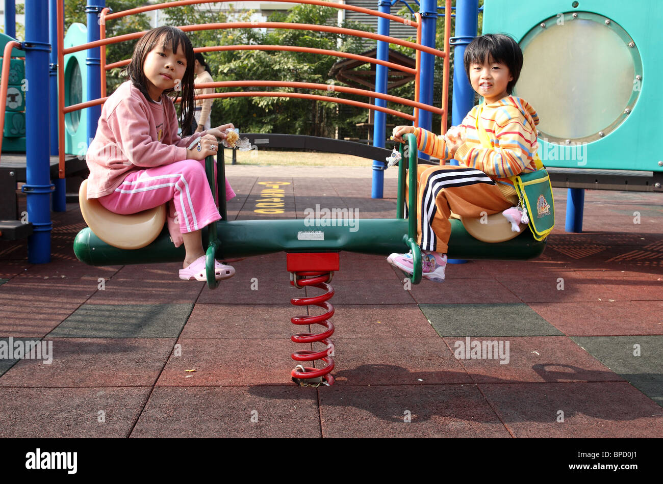 Teeter totter kids hires stock photography and images Alamy