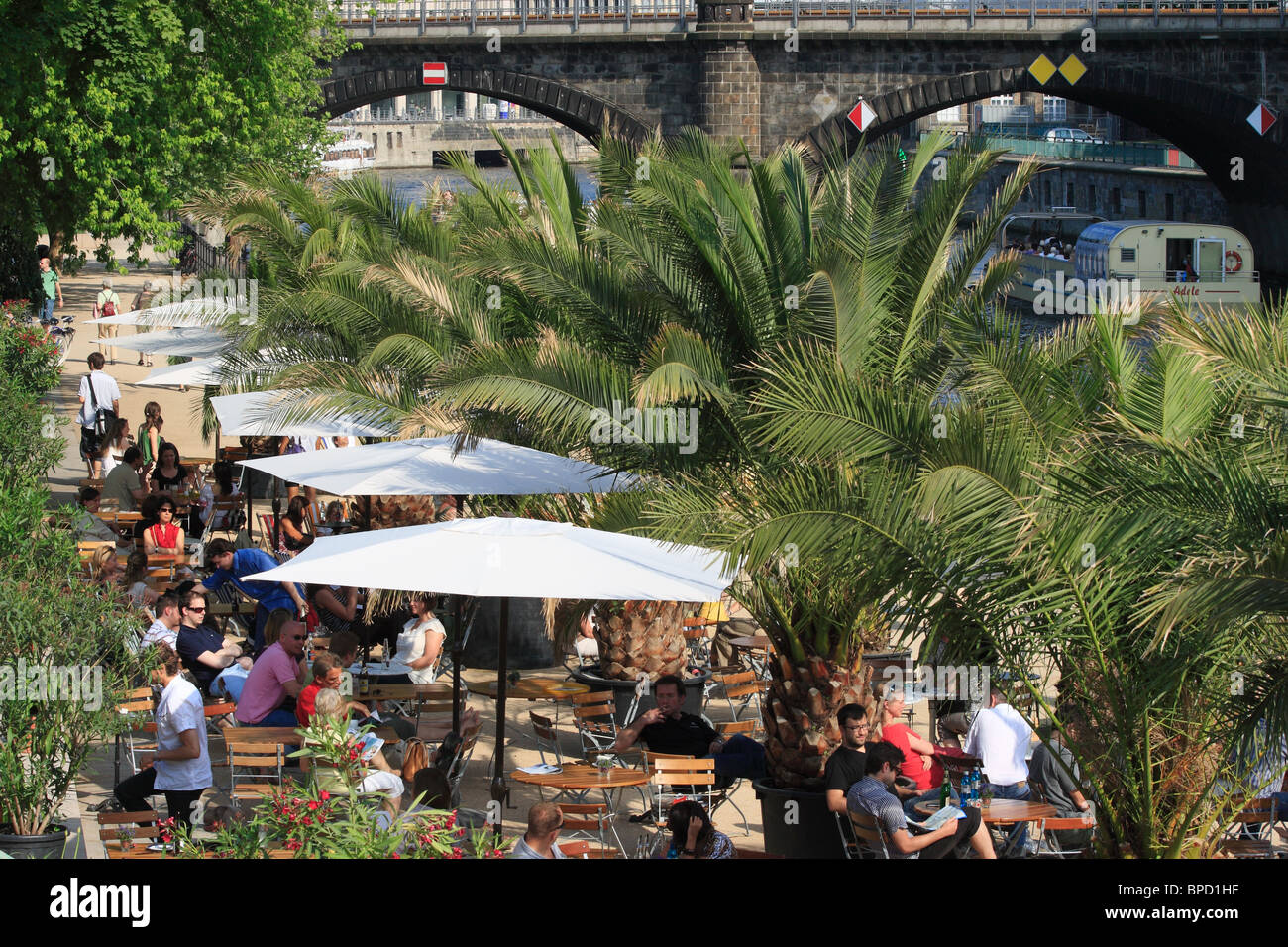 A beach bar with palm trees on the Museum Island, Berlin, Germany Stock Photo