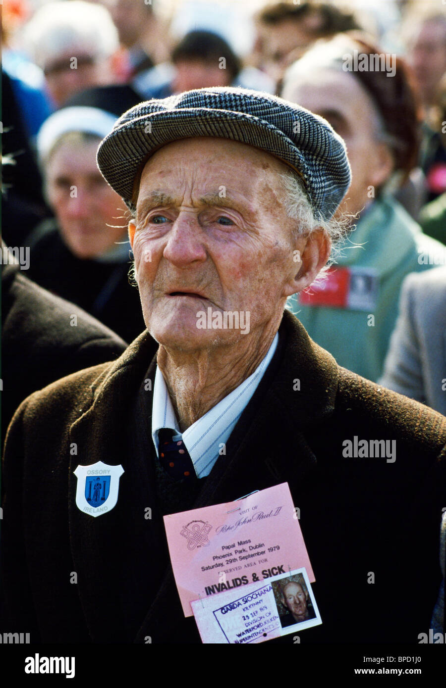 Pilgrim with official identity pass attends mass celebrated by Pope John Paul II in Knock, Ireland Stock Photo