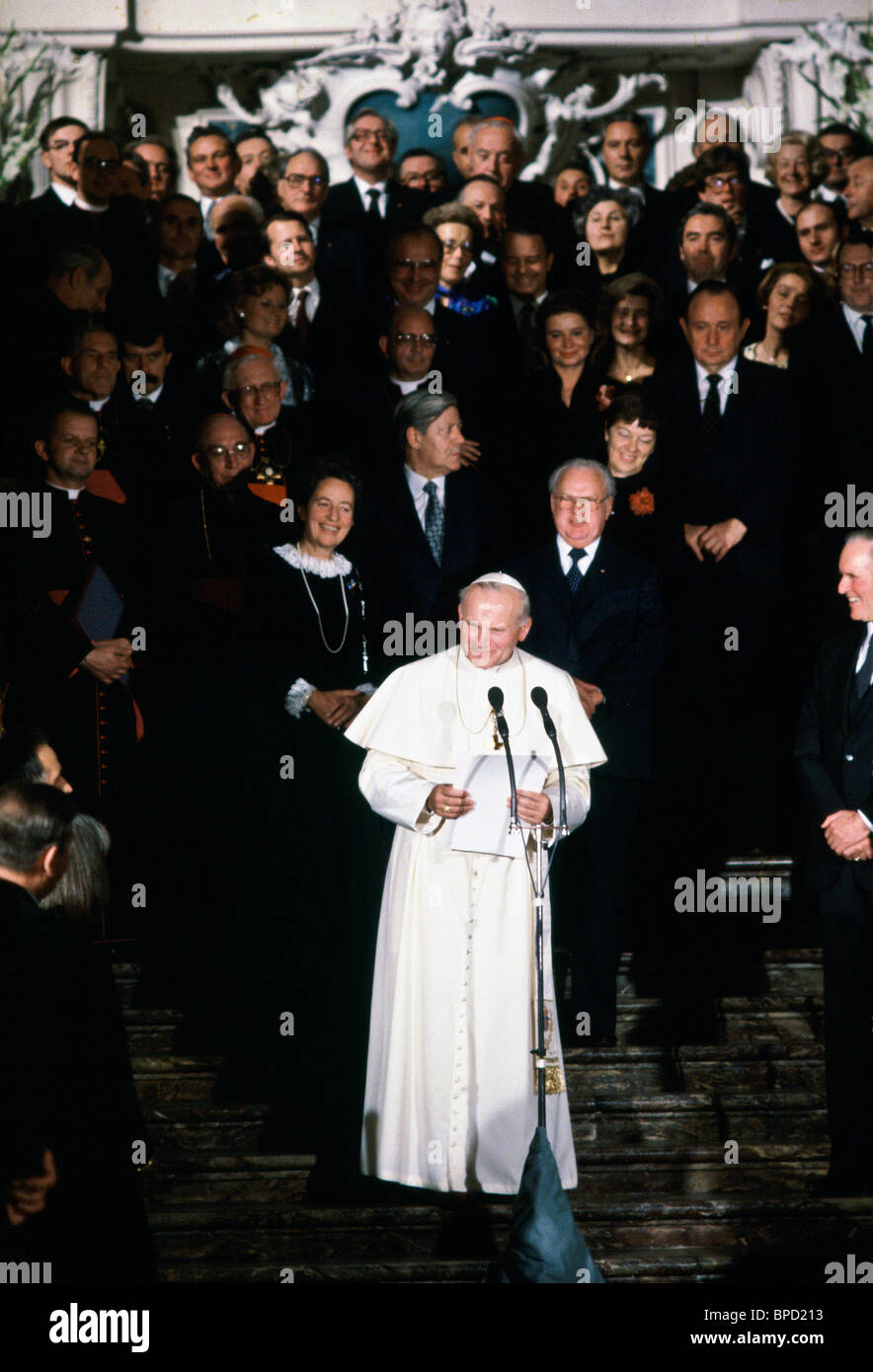 Pope John Paul II, with Chancellor Helmut Schmidt behind, making a speech during his visit to Germany Stock Photo