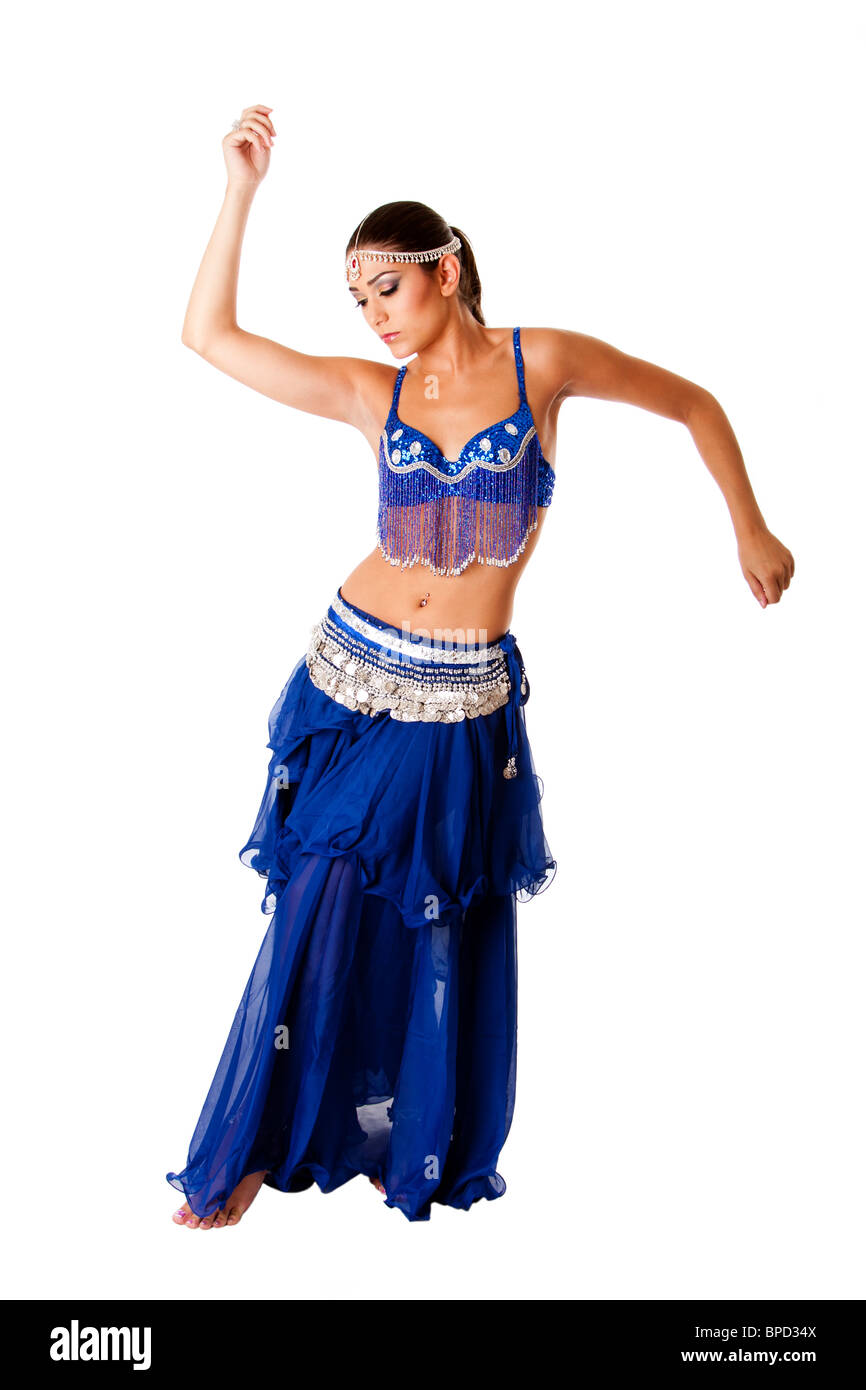 Arabic belly dancer harem woman in blue with silver dress and head jewelry  with gem dancing twirling her arms, isolated Stock Photo - Alamy