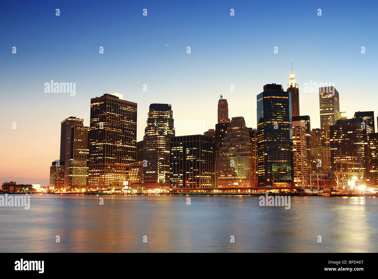 New York City Manhattan skyline at dusk over Hudson River with ...