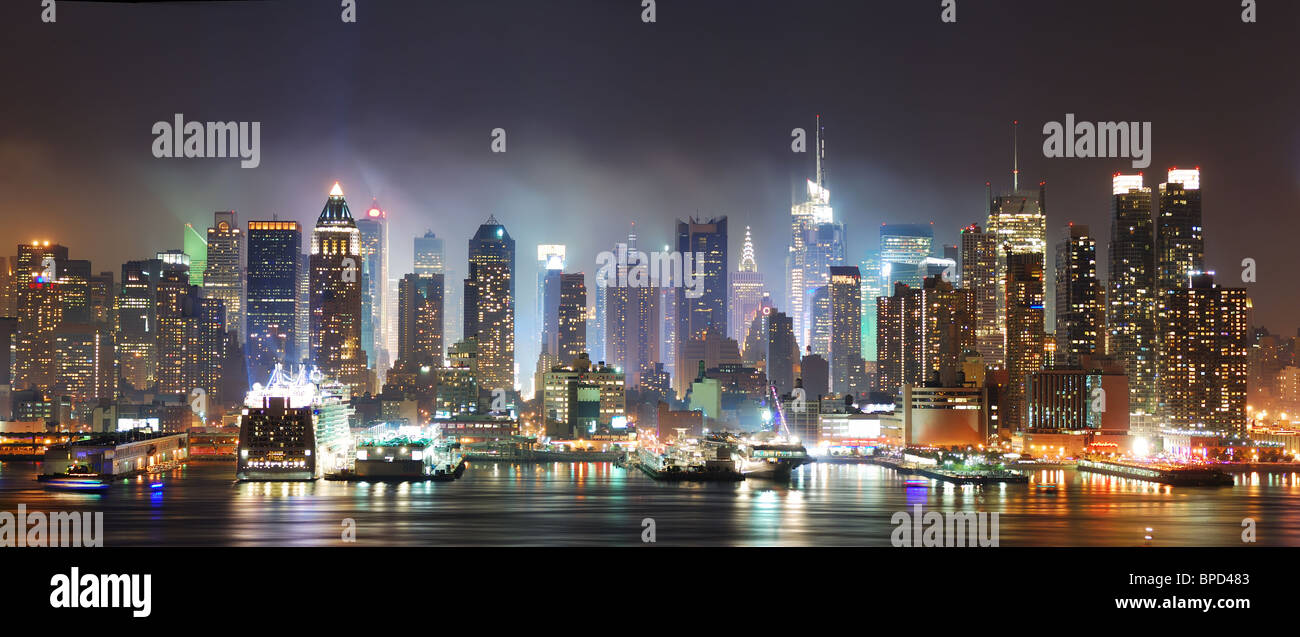 New York City Manhattan skyline panorama at night over Hudson River ...