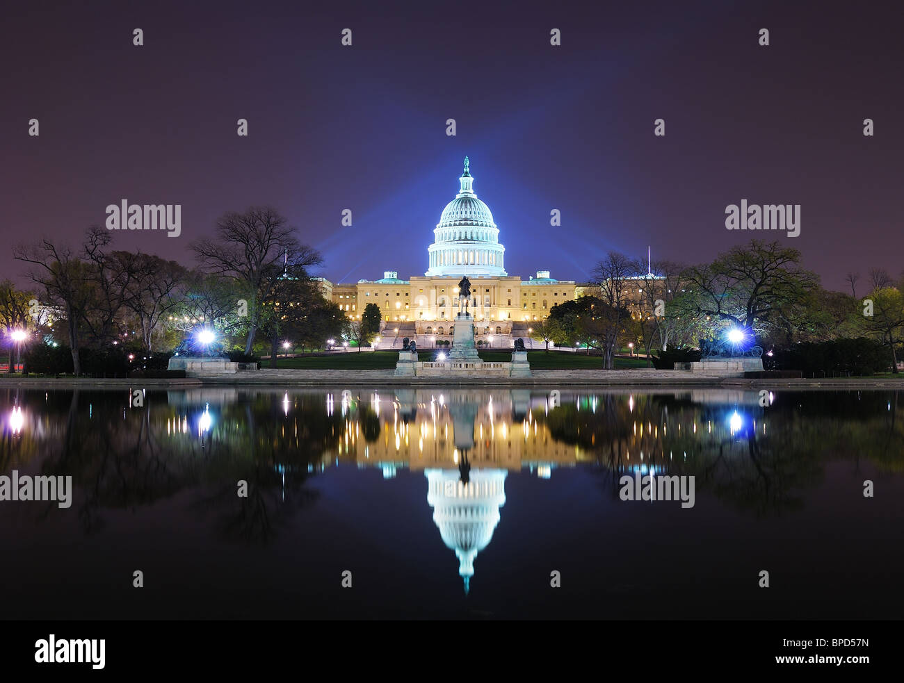 Capitol Hill at night with lake reflection in Washington DC. Stock Photo