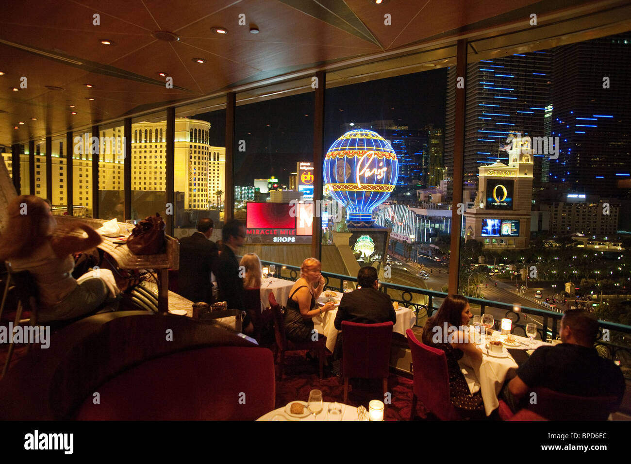 Diners in the Eiffel Tower restaurant, The Paris Hotel, look out