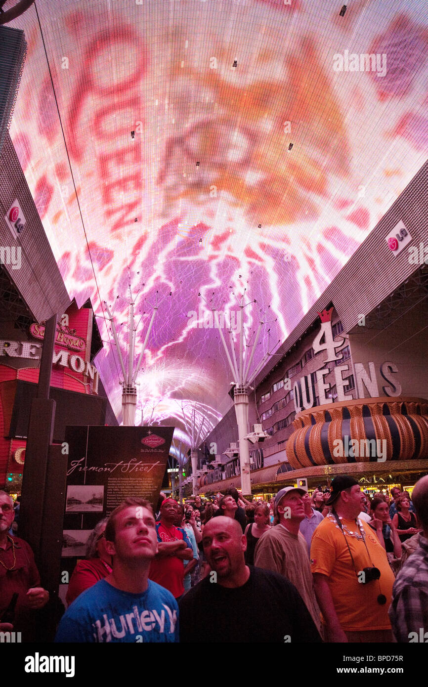 People enjoying the light show on the roof, Fremont Street, Downtown