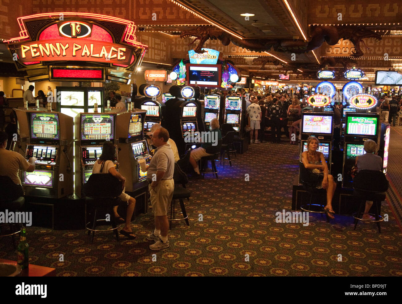 Gamblers trying their luck on the slot machines, Harrah's Casino, Las Vegas, Nevada, USA Stock Photo