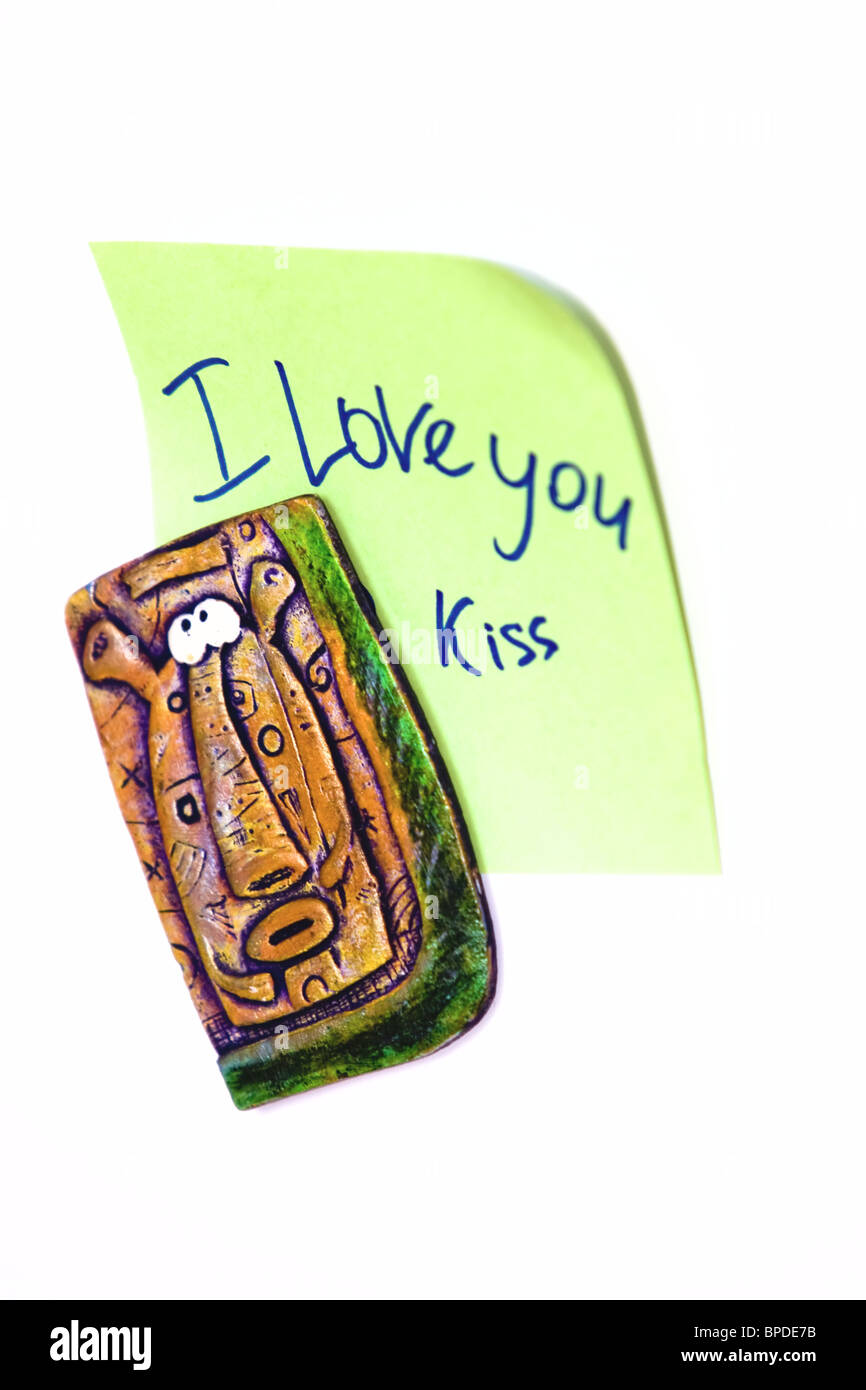 Blank green adhesive note with 'I Love You' wording on white background with shadow Stock Photo