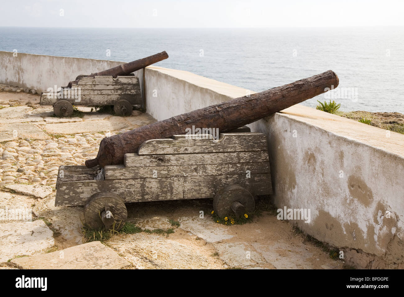 Cannons point along the Atlantic coast in the Fort at Sagres on the Algarve in Portugal. Stock Photo