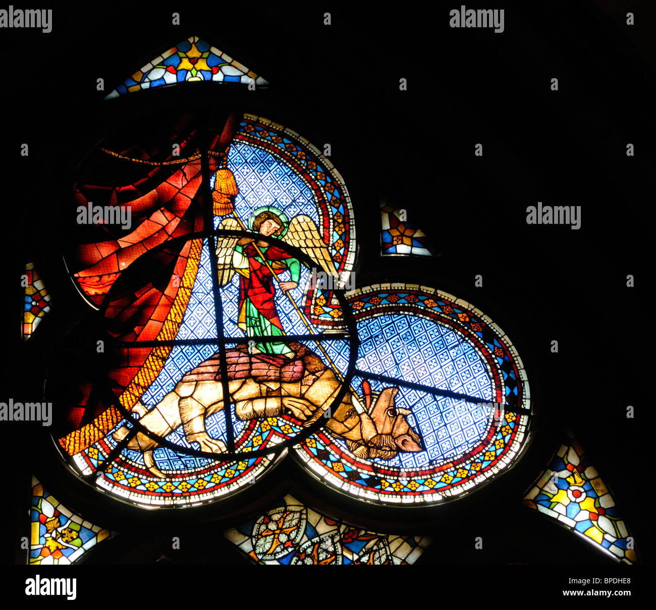 Freiburg in Breisgau, Baden-Wurttemberg, Germany. Freiburg Cathedral / Munster. Stained Glass Window. St George and the Dragon Stock Photo