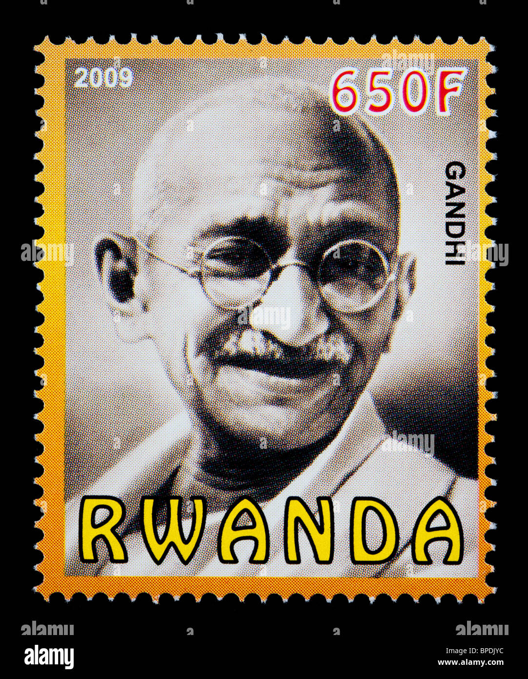 RWANDA - CIRCA 2009: A postage stamp printed in Rwanda showing Mohandas Karamchand Gandhi, circa 2009 Stock Photo