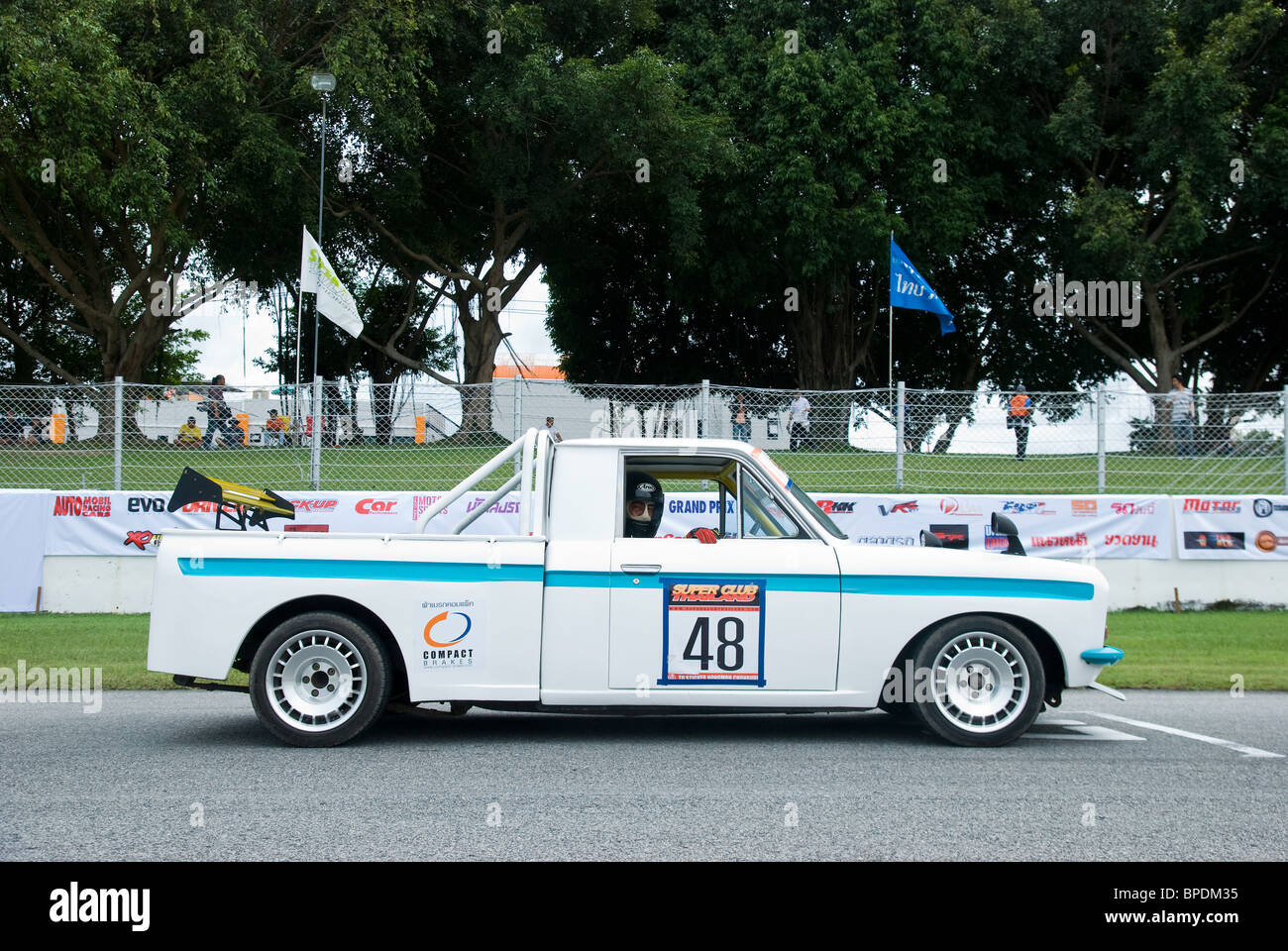 Classic Datsun pickup truck at the starting grid of classic car race on ...