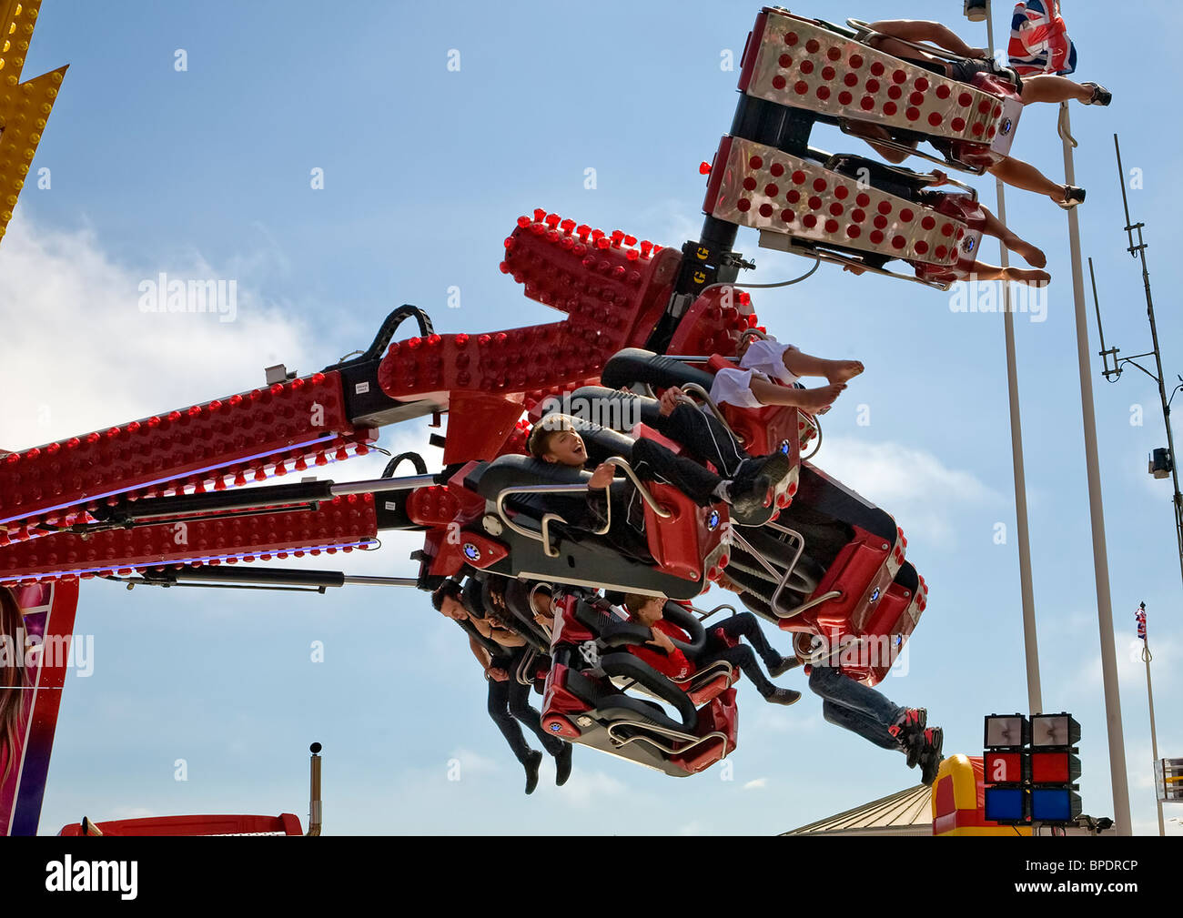 Fast Fairground Rides Fairground ride at the height of fast movement Stock Photo - Alamy