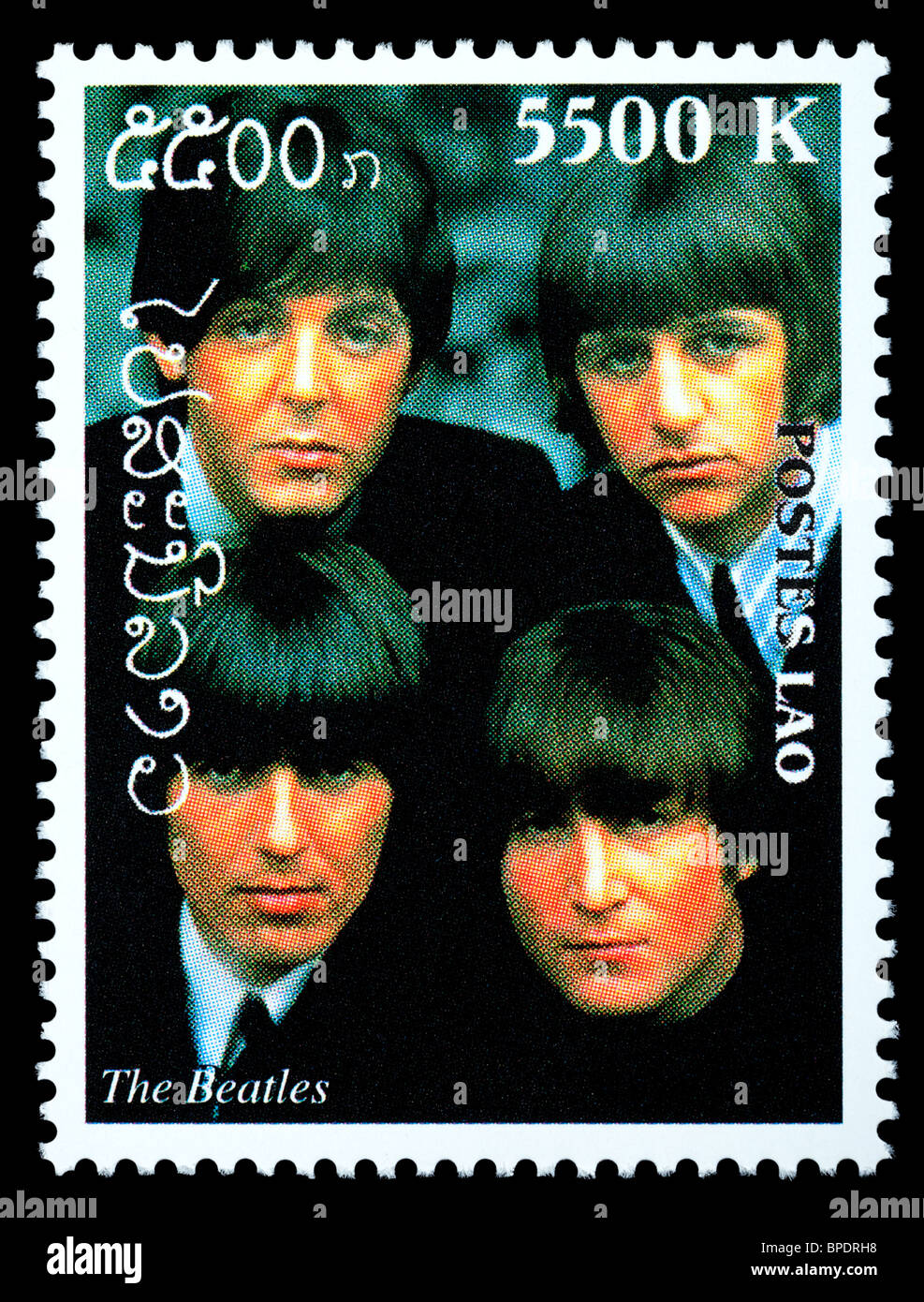 LAOS - CIRCA 2000: A postage stamp printed in Laos showing The Beatles; circa 2000 Stock Photo