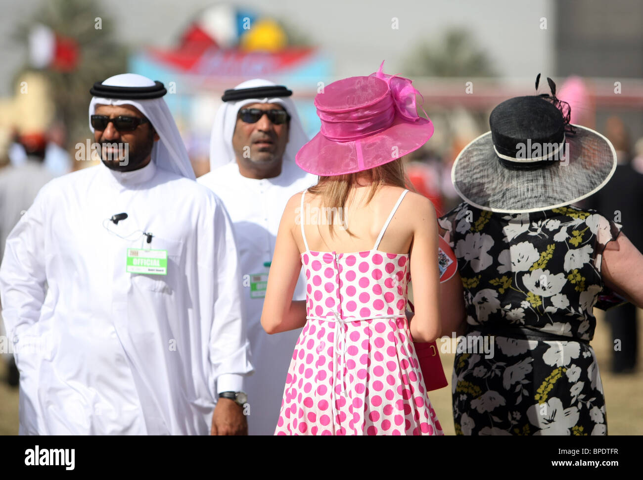 Elegantly dressed women seen from behind, Dubai, United Arab Emirates Stock Photo