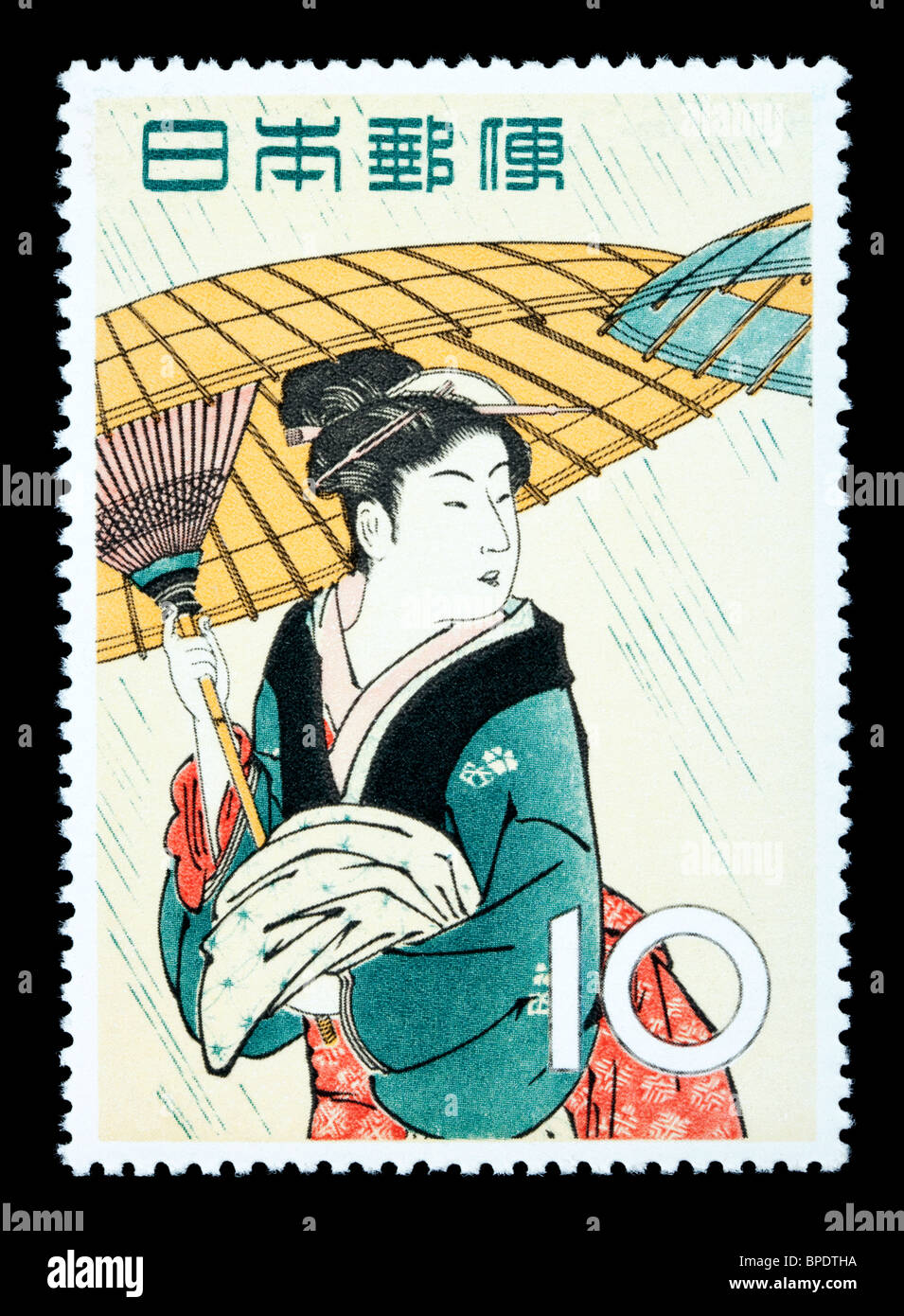 JAPAN - CIRCA 1966: A postage stamp printed in Japan showing a painting of a Japanese woman, circa 1966 Stock Photo