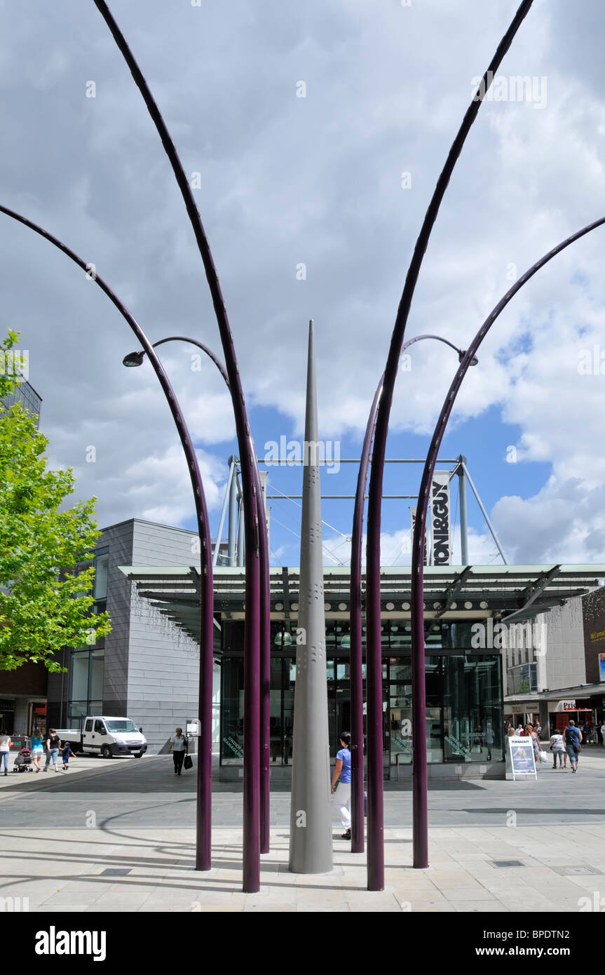 Modern Toni&Guy unisex hairdressing salon premises & summer shoppers in Basildon new town centre pedestrianised main shopping square on sunny day UK Stock Photo