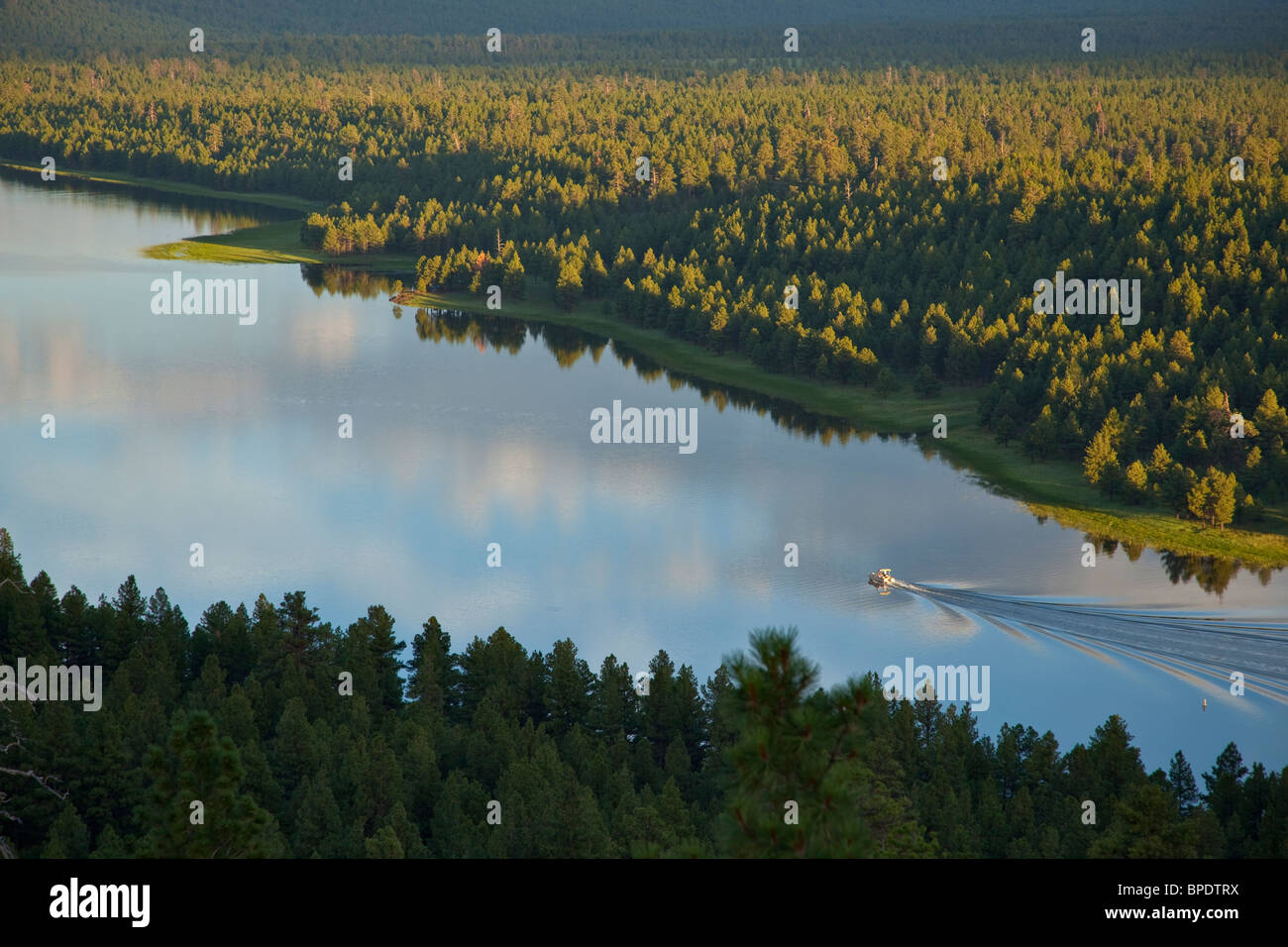 Boating on Upper Lake Mary viewed from rim of Anderson Mesa, summer in
