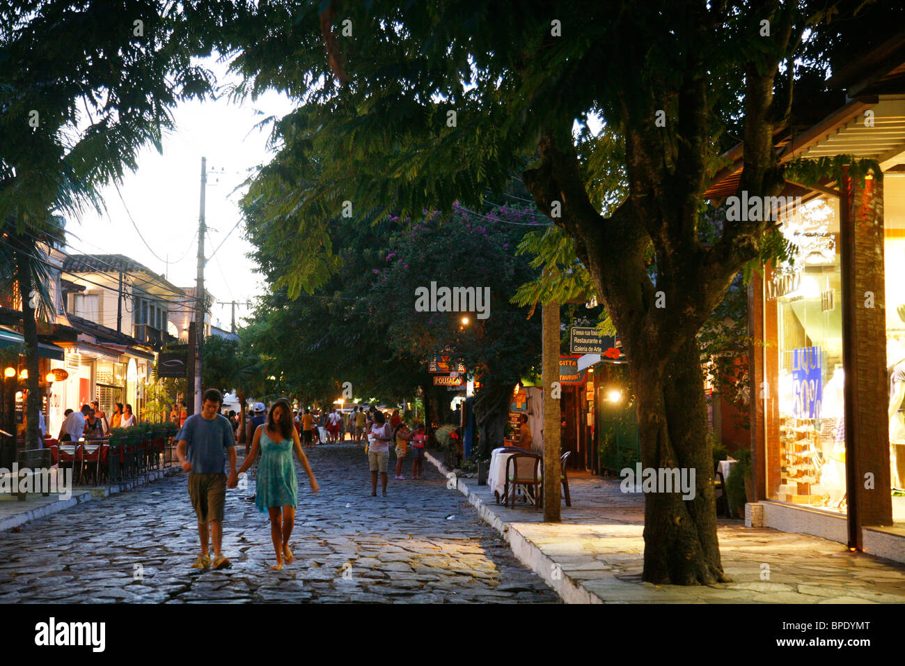 People walking at Rua das Pedras dotted with restaurants and boutiques, Buzios, Rio de Janeiro State, Brazil. Stock Photo