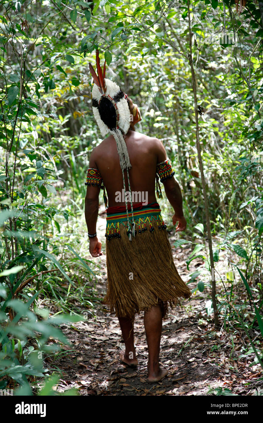 Pataxo Indian man walking at the Reserva Indigena da Jaqueira near Porto Seguro, Bahia, Brazil. Stock Photo