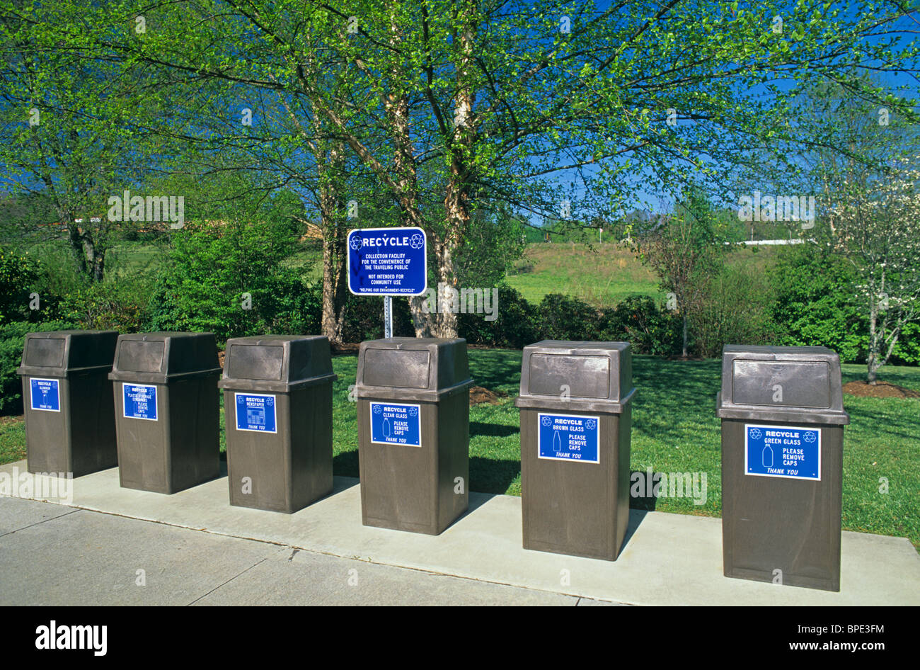 Recycling bins along roadside park Southeastern USA Stock Photo