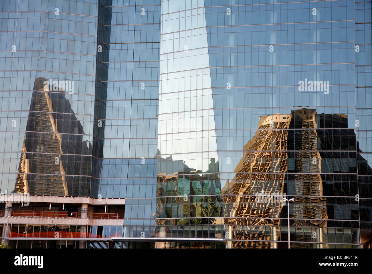 Catedral Metropolitana reflected on a modern glass building, , Rio de Janeiro, Brazil. Stock Photo