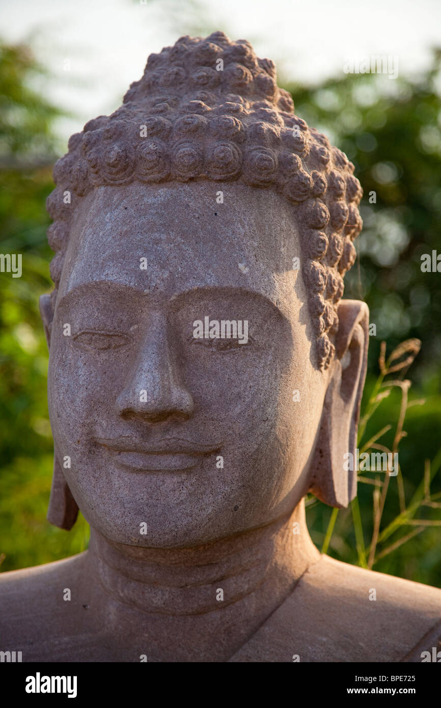 Stone Buddha head - Phnom Penh, Cambodia Stock Photo - Alamy