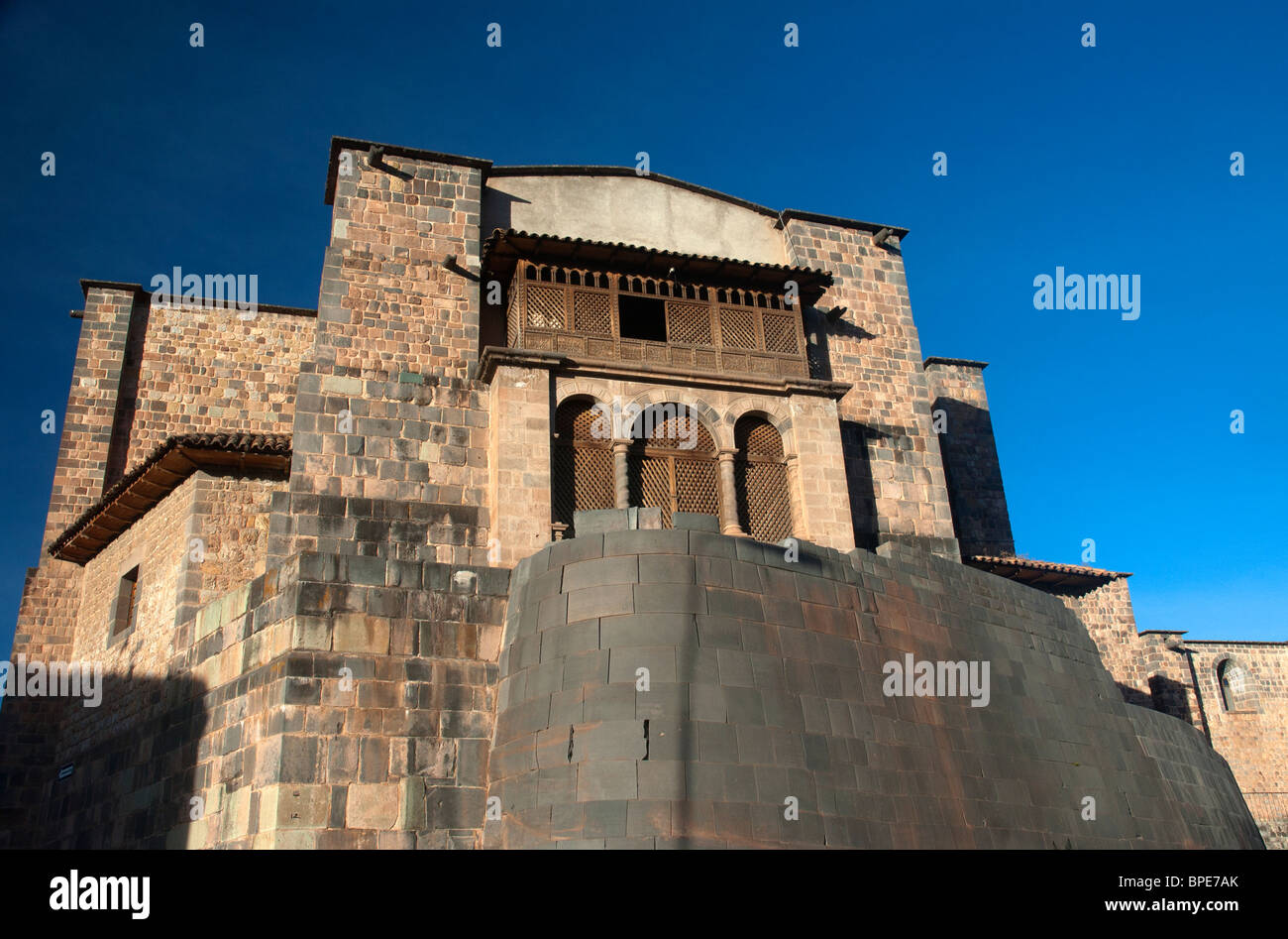The church of Santo Domingo, sits on the Inca Coricancha, showing the destruction wrought by the Catholic Church, Cusco, Peru. Stock Photo
