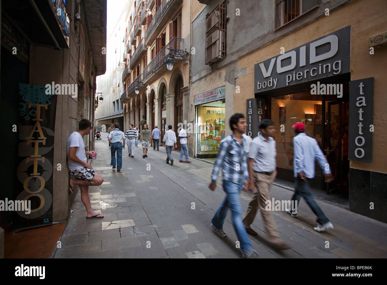 Barcelona El Raval shops with people Stock Photo