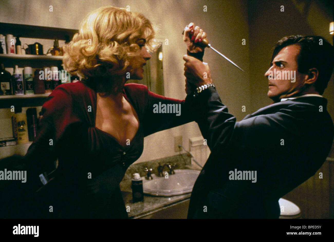 SEAN YOUNG, ARMAND ASSANTE, FATAL INSTINCT, 1993 Stock Photo