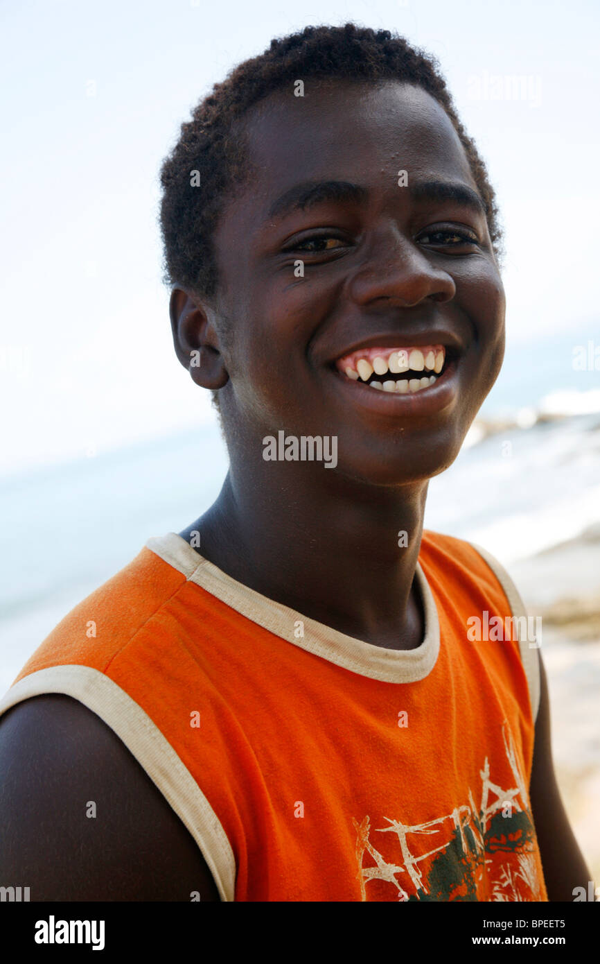 Portrait of a boy in Porto da Barra beach, Salvador, Bahia, Brazil. Stock Photo