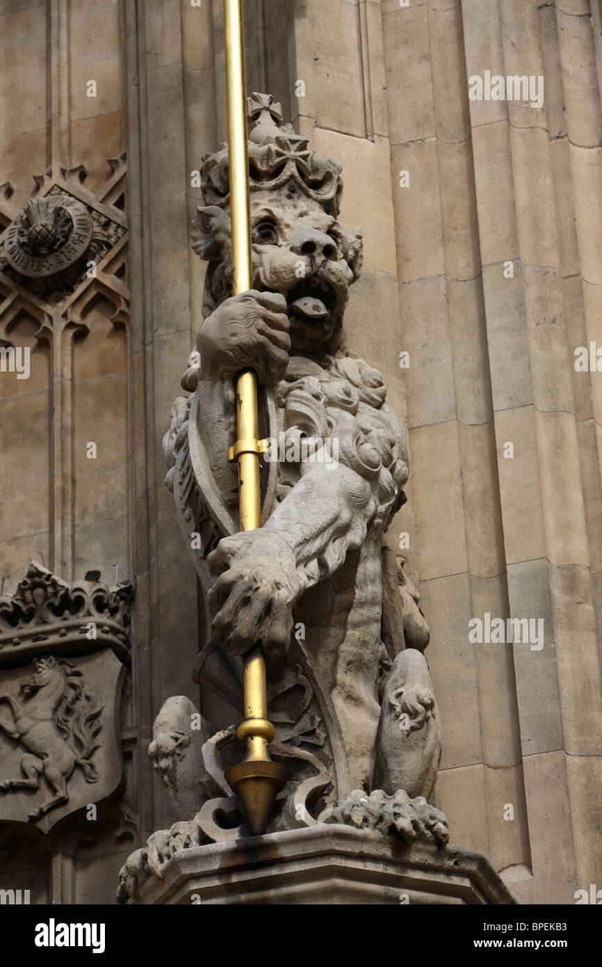 Sculpture of a heraldic lion emblem on the Houses of Parliament, Westminster, London, SW1. Stock Photo