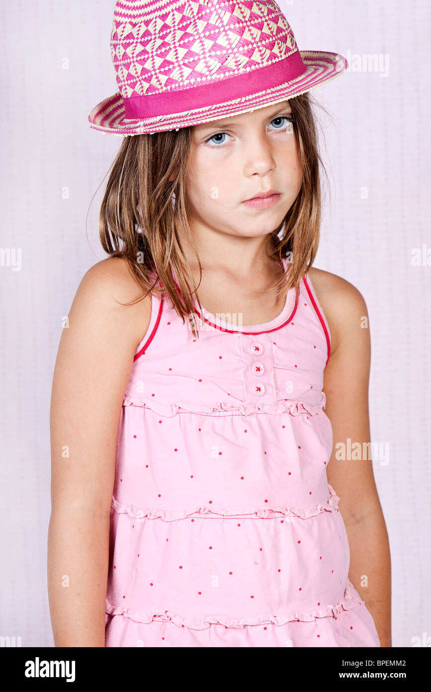 Shot of a Young Girl in Pink Attire against Pink Background Stock Photo ...