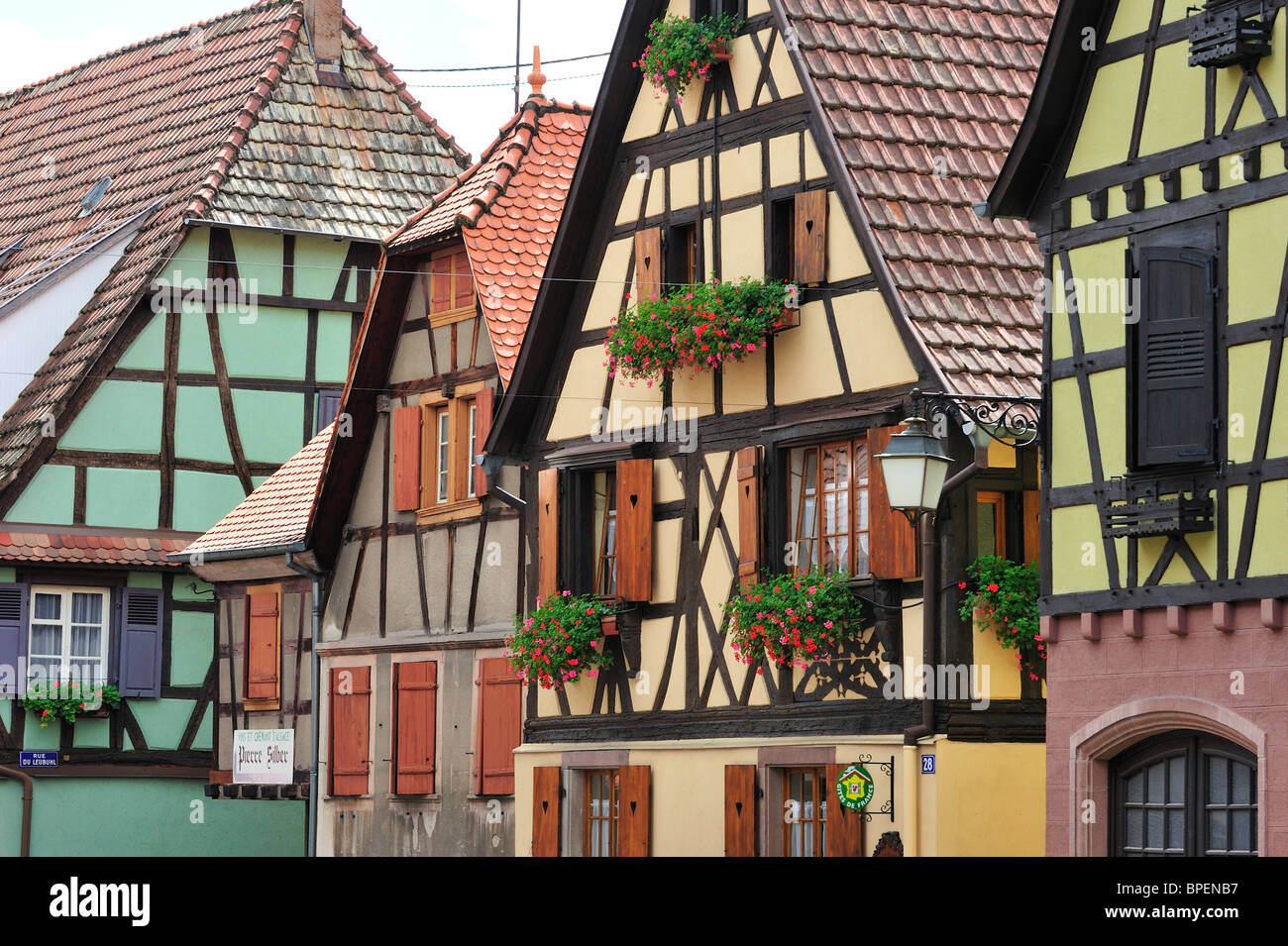 Colorful façades of timber framed houses at Dambach-la-Ville, Alsace, France Stock Photo